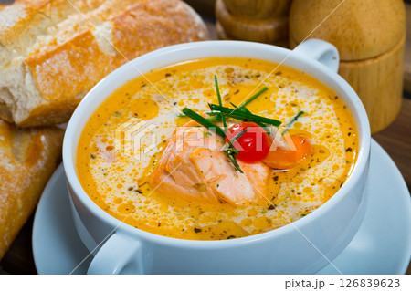 Norwegian soup with salmon with baguette Norwegian soup with salmon with baguette 126839623