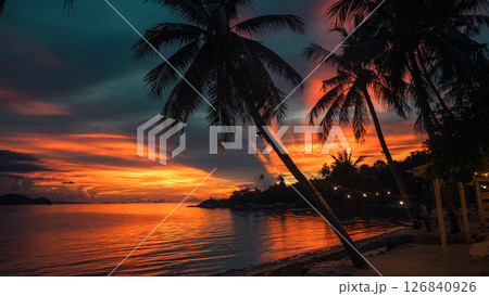 Palm Trees on White Sandy Beach with Island View in Azure Sea 126840926