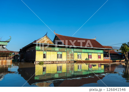 Traditional Bugis floating houses on Lake Tempe, Sulawesi, Indonesia Traditional Bugis floating houses on Lake Tempe, Sulawesi, Indonesia 126841546