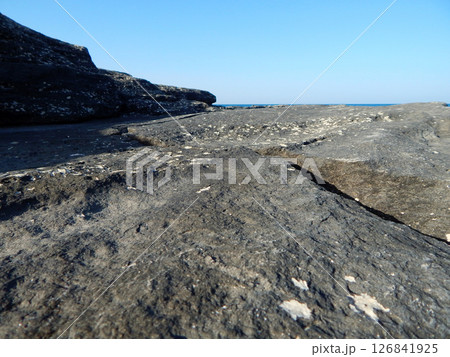 Rocky shore of the Caspian Sea. 126841925