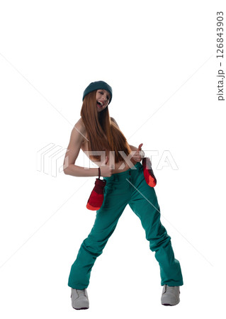 Woman in playful pose wearing lingerie and colorful accessories indoors Woman in playful pose wearing lingerie and colorful accessories indoors 126843903