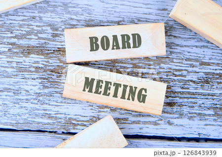 The conceptual phrase of the BOARD MEETING. Business and Meeting agenda concept. Copy space The conceptual phrase of the BOARD MEETING. Business and Meeting agenda concept. Copy space 126843939