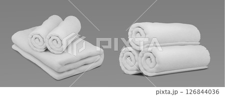 Folded white spa towel linens on gray background 126844036
