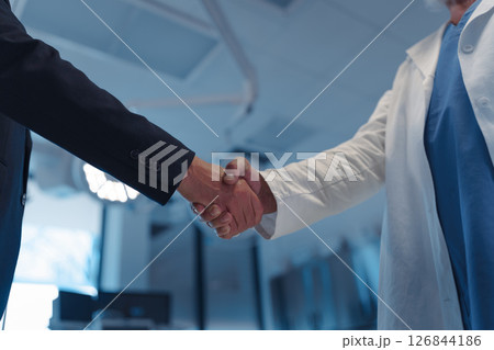 Hospital business handshake in medical environment 126844186