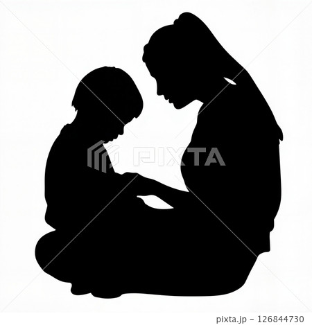 Tender mother reading to child in silhouette, love and learning 126844730