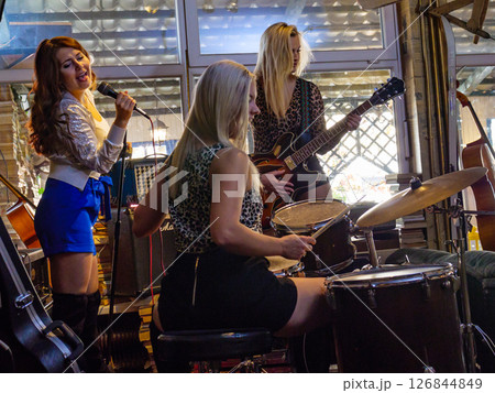 Music band performing on stage. Music band performing on stage. 126844849