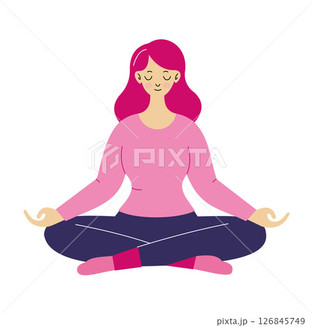 A young woman with pink hair sits cross-legged in a meditative pose. A young woman with pink hair sits cross-legged in a meditative pose. 126845749