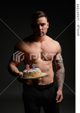Celebrating a 32nd birthday with fitness and vitality in a studio setting 126847849