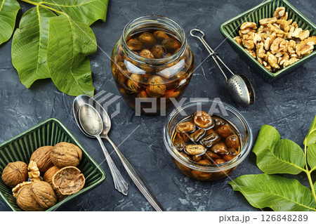 Bank of jam walnuts. 126848289