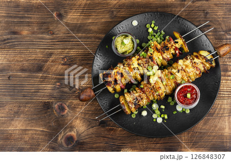 Delicious skewers with potatoes. 126848307