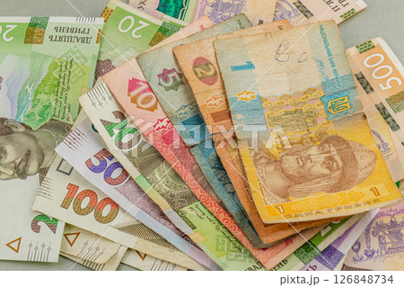 Currency collection showing various denominations of banknotes 126848734