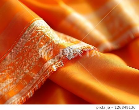Elegant Orange Silk Fabric Texture Detailed Closeup Shot High Resolution gold rich soft warm drape 126849136