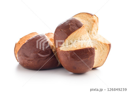 Crunchy bavarian buns isolated on white background. Crunchy bavarian buns isolated on white background. 126849239