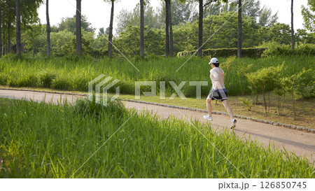 Outdoor Running Routine on a Sunny Day. Running Motivation. Start Your Fitness Journey. 126850745