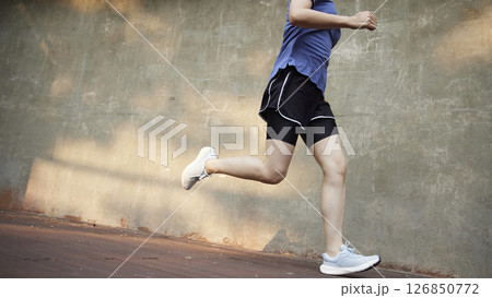 Outdoor Running Routine on a Sunny Day. Running Motivation. Start Your Fitness Journey. 126850772