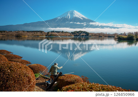 Fishing at Lake Tanuki with Mount Fuji View, Fujinomiya, Japan Fishing at Lake Tanuki with Mount Fuji View, Fujinomiya, Japan 126850966