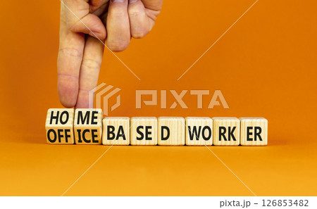 Home or office based worker symbol. Concept words Office based worker Home based worker on wooden cubes. Beautiful orange background. Business, home or office based worker concept. Copy space. Home or office based worker symbol. Concept words Office based worker Home based worker on wooden cubes. Beautiful orange background. Business, home or office based worker concept. Copy space. 126853482