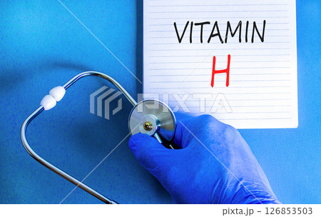Vitamin H symbol. Concept words Vitamin H on beautiful white note. Doctor's hand in blue medical glove. Stethoscope. Beautiful blue background. Medical healthy lifestyle Vitamin H concept. Vitamin H symbol. Concept words Vitamin H on beautiful white note. Doctor's hand in blue medical glove. Stethoscope. Beautiful blue background. Medical healthy lifestyle Vitamin H concept. 126853503