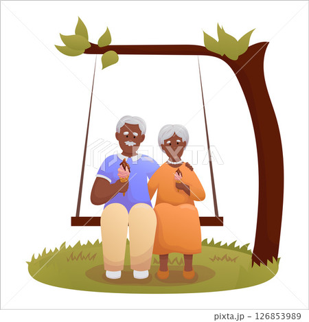 Cute elderly couple swinging on swing. Happy seniors spending time outdoors together 126853989