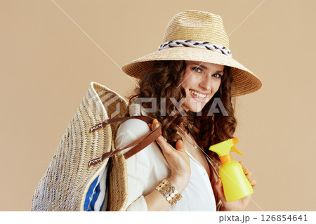 happy trendy woman in blouse and shorts on beige happy trendy woman in blouse and shorts on beige 126854641