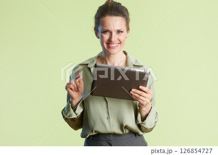 Woman pointing to tablet screen 126854727