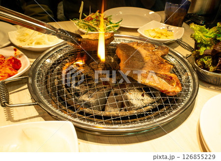 Preparing Traditional Korean Barbecue Grill Pork. Meat. 126855229