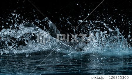 Clear water splash on a black background , close-up 126855300