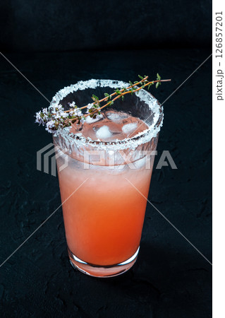 Salty Dog cocktail with fresh grapefruit juice, lime juice, and thyme 126857201