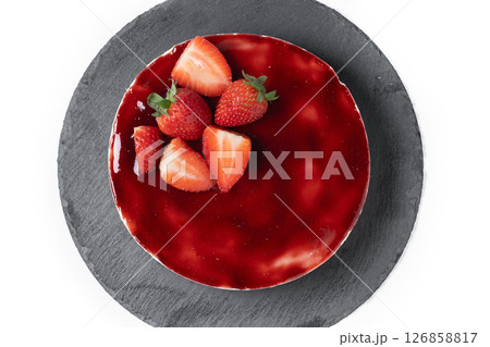 Cheesecake with strawberries isolated on white background Cheesecake with strawberries isolated on white background 126858817
