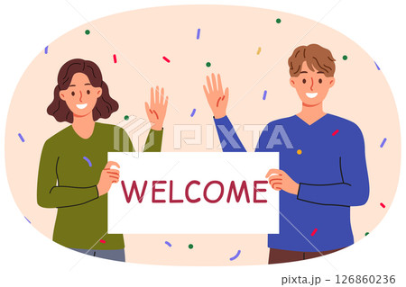 Welcome banner in hands man and woman waving hand in greeting and inviting guests to festival 126860236