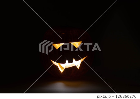 one halloween pumpkin backlit background 126860276