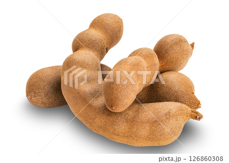 Pile of ripe sweet Tamarind or Tamarindus indica isolated on white background. Pile of ripe sweet Tamarind or Tamarindus indica isolated on white background. 126860308