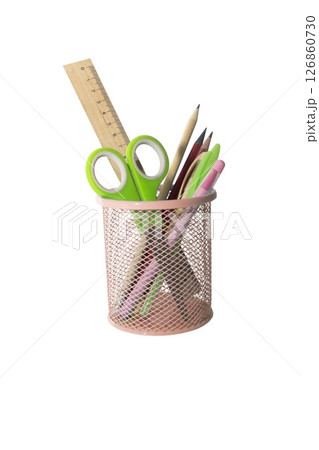School and office supplies, pens, pencils, ruler, compass in a metal cup on a white background. 126860730