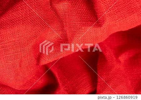 Red Linen Fabric with Visible Fibers and Weave. 126860919