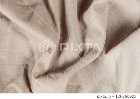 Close-Up of Abstract Beige Textile Surface 126860923