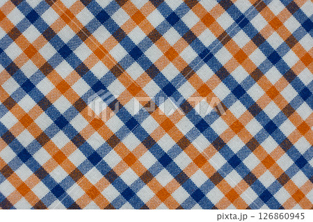 Macro texture of a fabric consisting of one hundred percent cotton. Macro texture of a fabric consisting of one hundred percent cotton. 126860945
