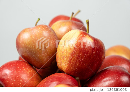 Close-Up View of a Group of Fresh Ripe Red Apples 126861008