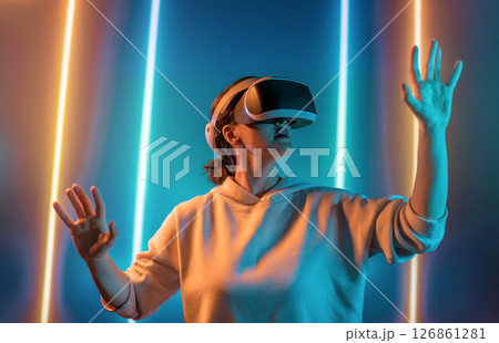 Woman with VR virtual reality goggles Woman with VR virtual reality goggles 126861281