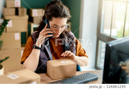 Woman working in a warehouse 126861295