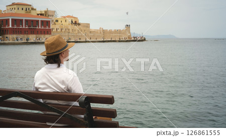 Tourist admiring venetian fortress koules in heraklion, crete, greece 126861555