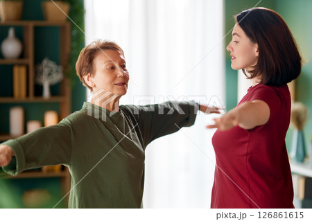 Senior woman doing exercise Senior woman doing exercise 126861615