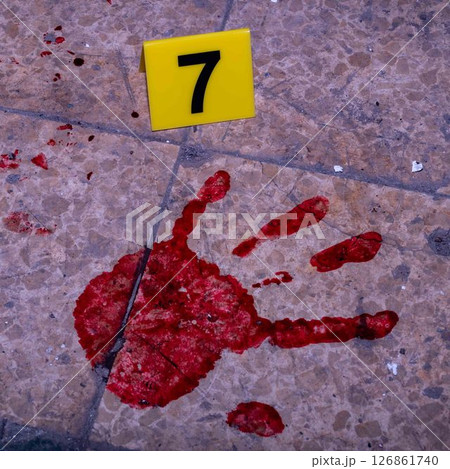 Bloody Handprint on Floor with Evidence Marker at Crime Scene Bloody Handprint on Floor with Evidence Marker at Crime Scene 126861740