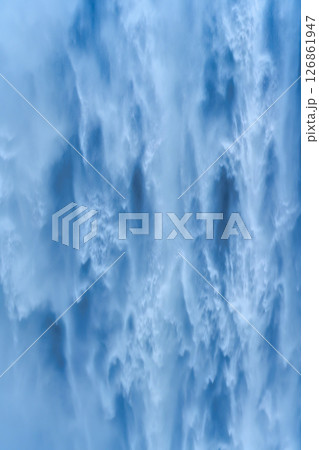 Abstract blue waterfall flowing serene atmosphere Abstract blue waterfall flowing serene atmosphere 126861947