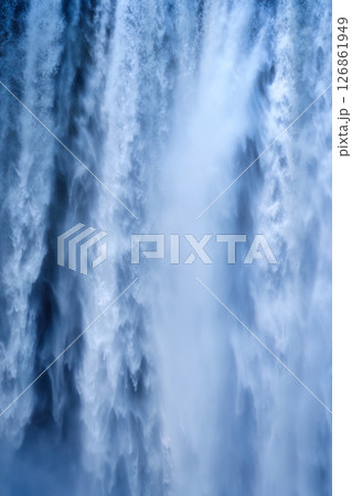Abstract blue waterfall flowing serene atmosphere Abstract blue waterfall flowing serene atmosphere 126861949