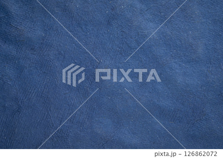 macro background and texture of  backlit bark paper handmade in Mexico 126862072