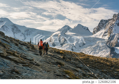 Group of backpacker hiking on alpine summit at Switzerland 126862106