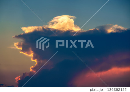 Vibrant clouds and blue sky in the sunset Vibrant clouds and blue sky in the sunset 126862125