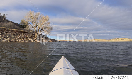 winter kayaking or canoeing on Horsetooth Reservoir near Fort Collins, Colorado - POV paddler perspective 126862246