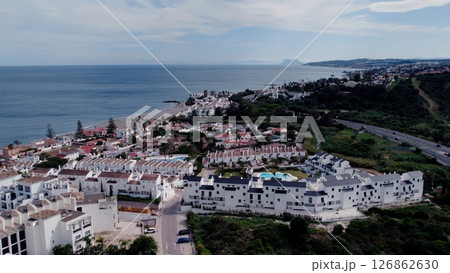 Aerial view of architecturally-designed modern prestige homes with pools in outer suburban Spain 126862630