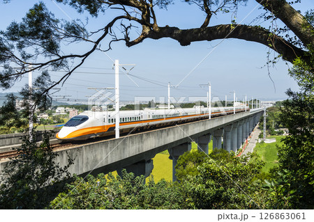 Overlooking view of the Taiwan High Speed Rail trains passing the Waipu of Taichung in Taiwan, It is the only high-speed railway in Taiwan. 126863061